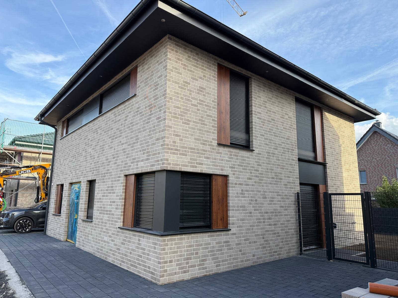 Wohnhaus mit Fassadenbekleidung aus HPL-Paneelen